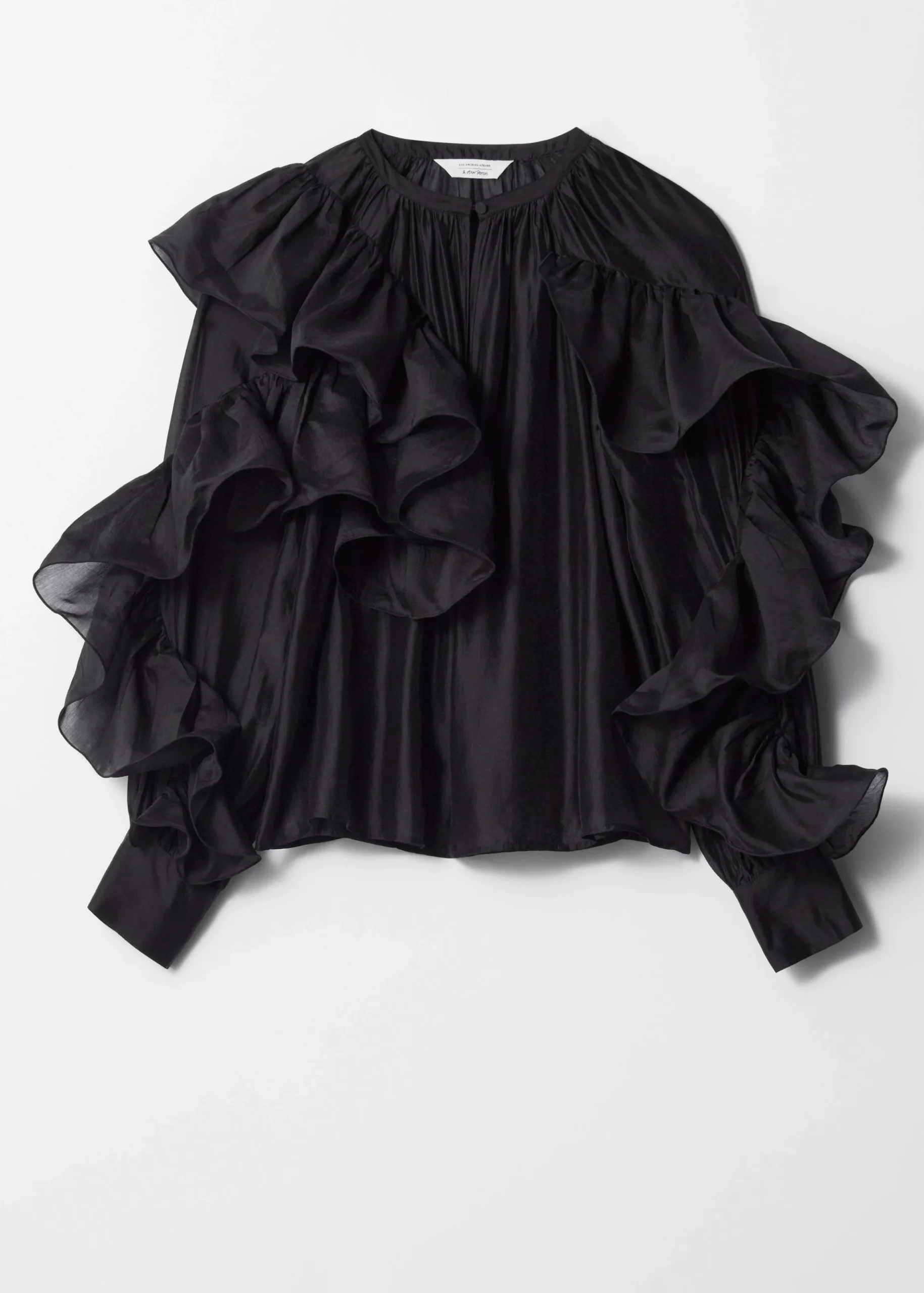 Asymmetrische Bluse mit Rüschen