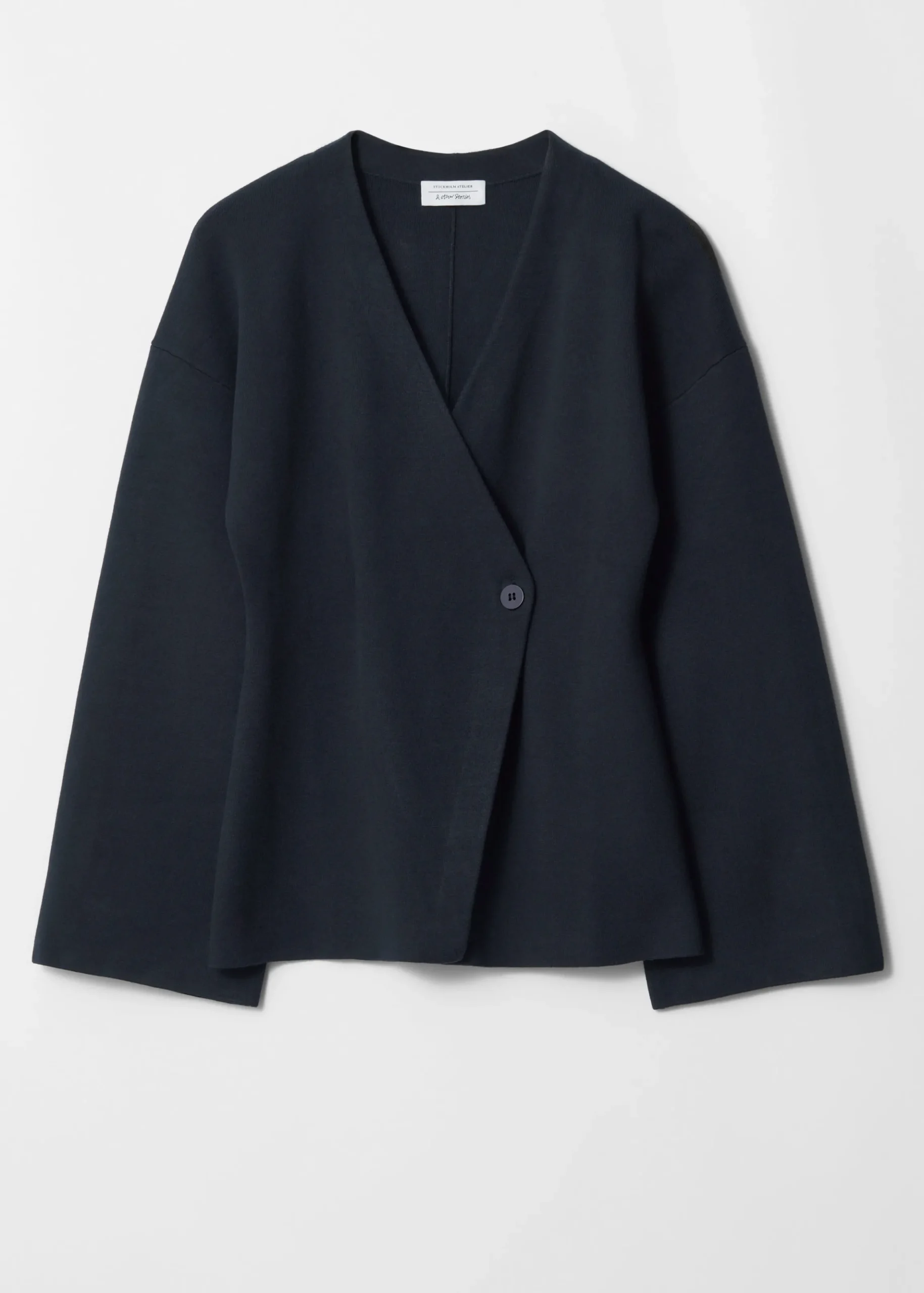 Asymmetrische Strickjacke
