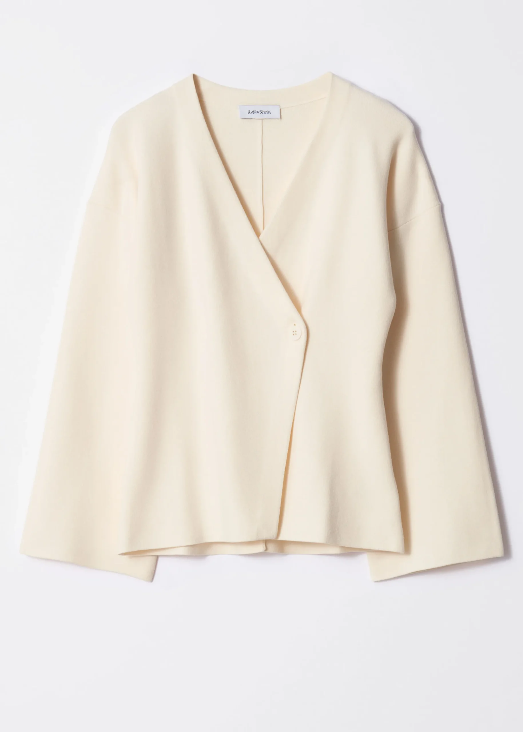 Asymmetrische Strickjacke
