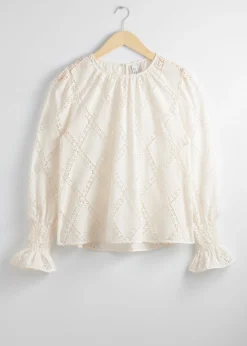 Bestickte Bluse mit gerafften Bündchen