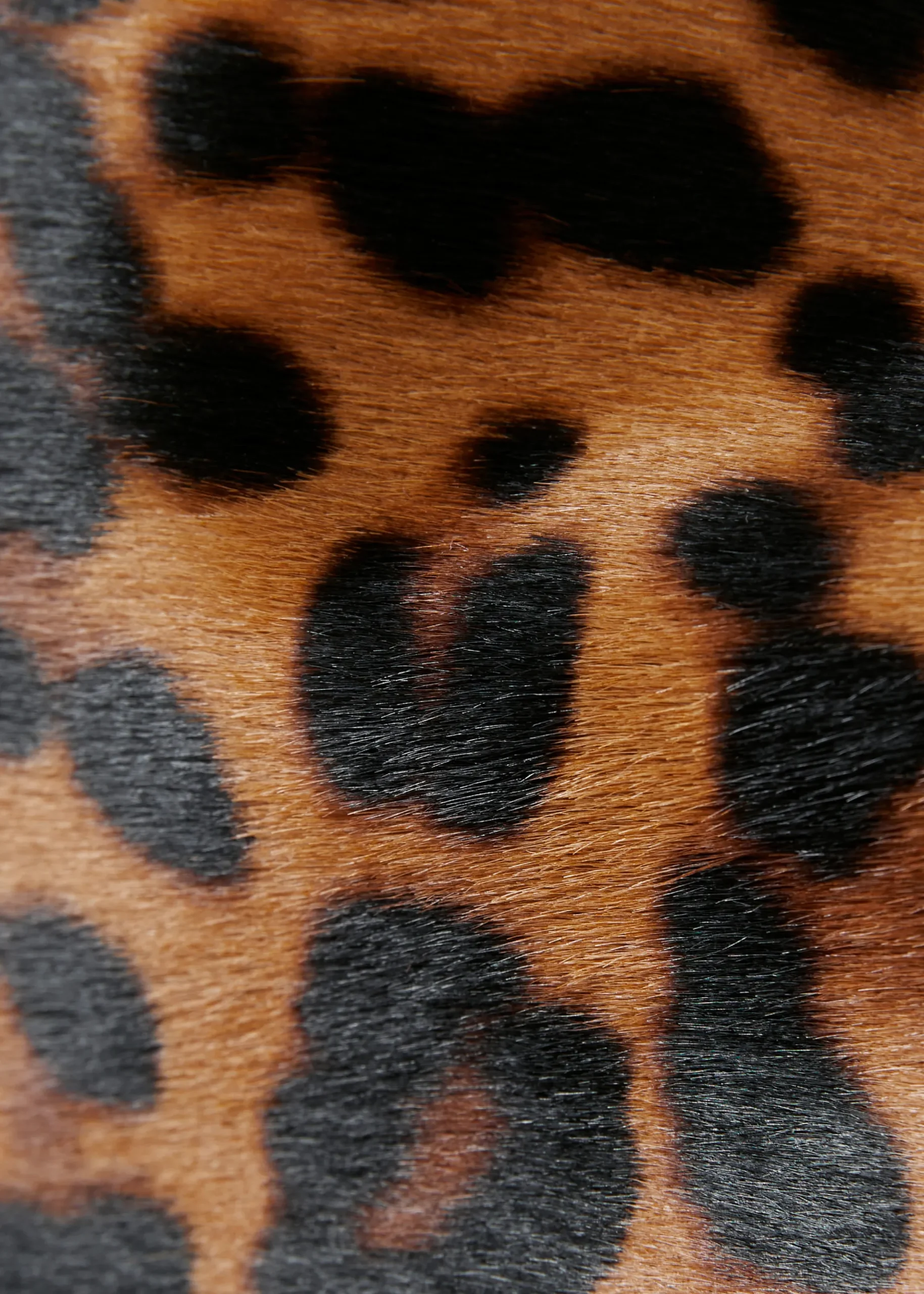 Clutch aus Leder mit Leopardenmuster