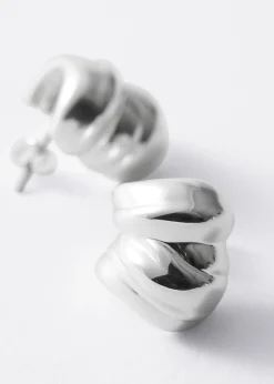 Creolen mit markant-skulpturaler Form