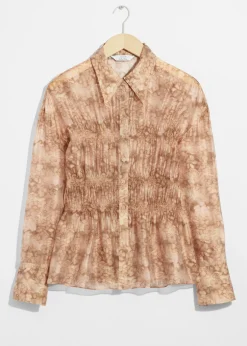 Durchscheinende Bluse mit Schößchen