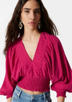 Gesmokte Bluse mit Puffärmeln