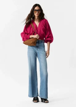 Gesmokte Bluse mit Puffärmeln
