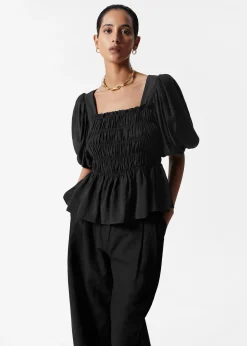 Gesmokte Bluse mit Puffärmeln