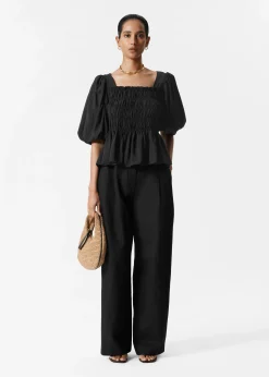 Gesmokte Bluse mit Puffärmeln