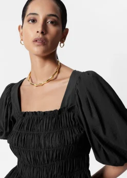 Gesmokte Bluse mit Puffärmeln