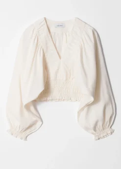 Gesmokte Bluse mit Puffärmeln