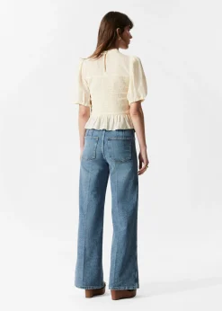 Gesmokte Bluse mit Schößchen