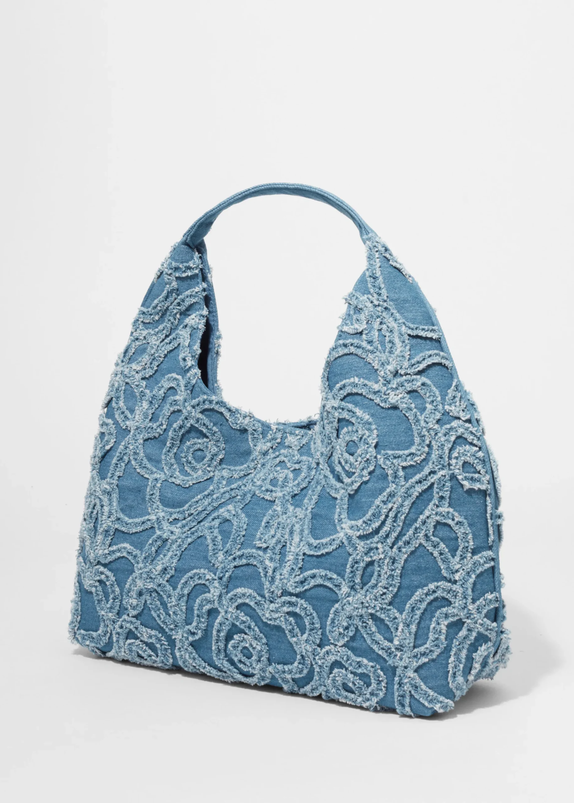 Kleine Tragetasche aus Denim mit Applikationen