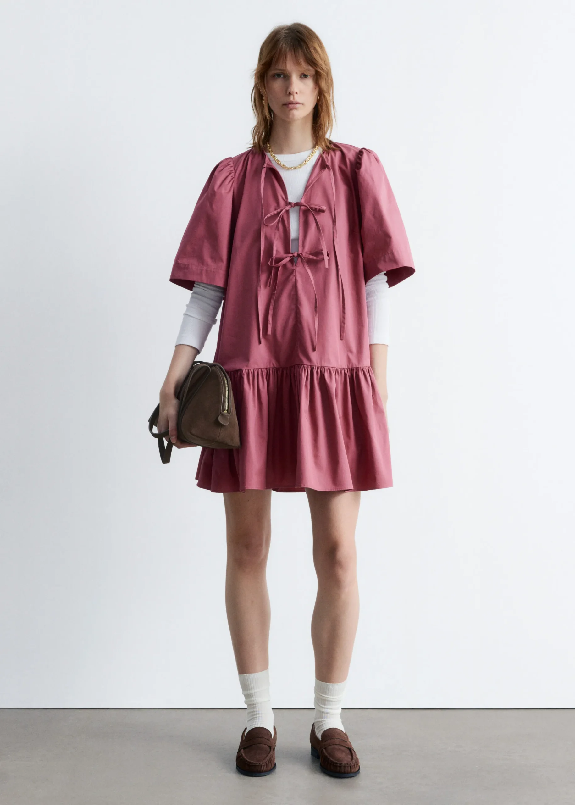 Minikleid mit Schößchen