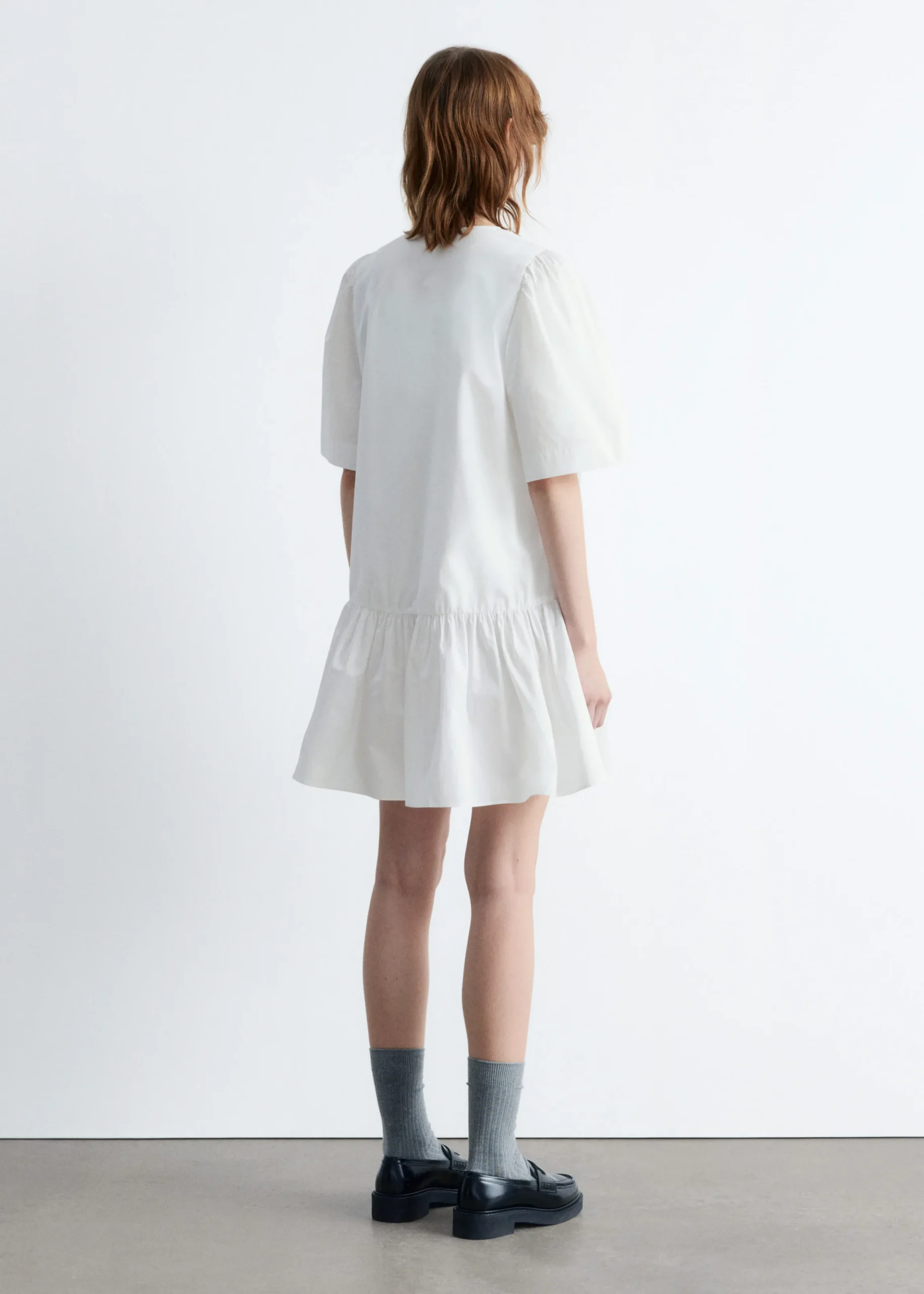 Minikleid mit Schößchen