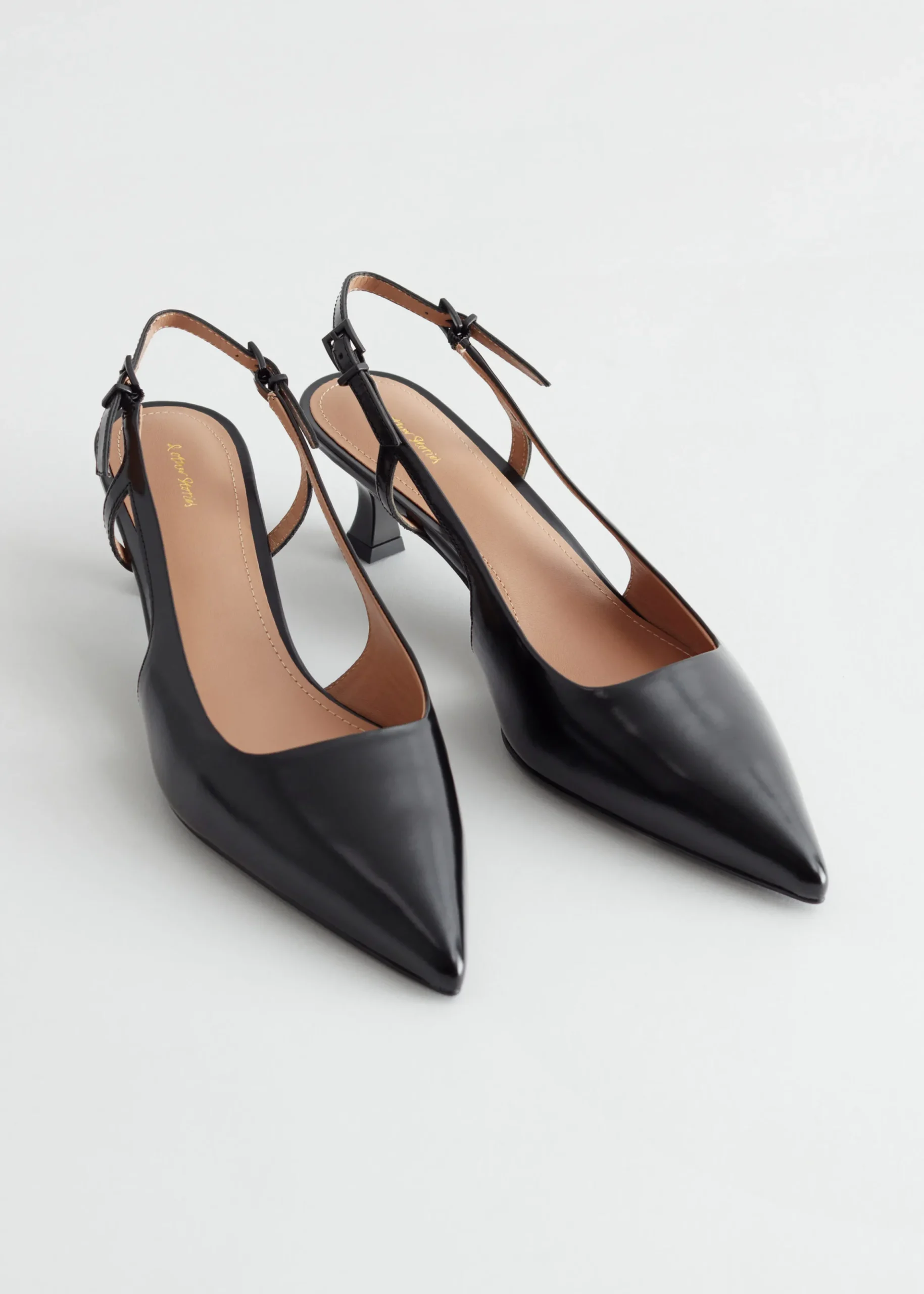 Pumps aus Leder mit Fersenriemen
