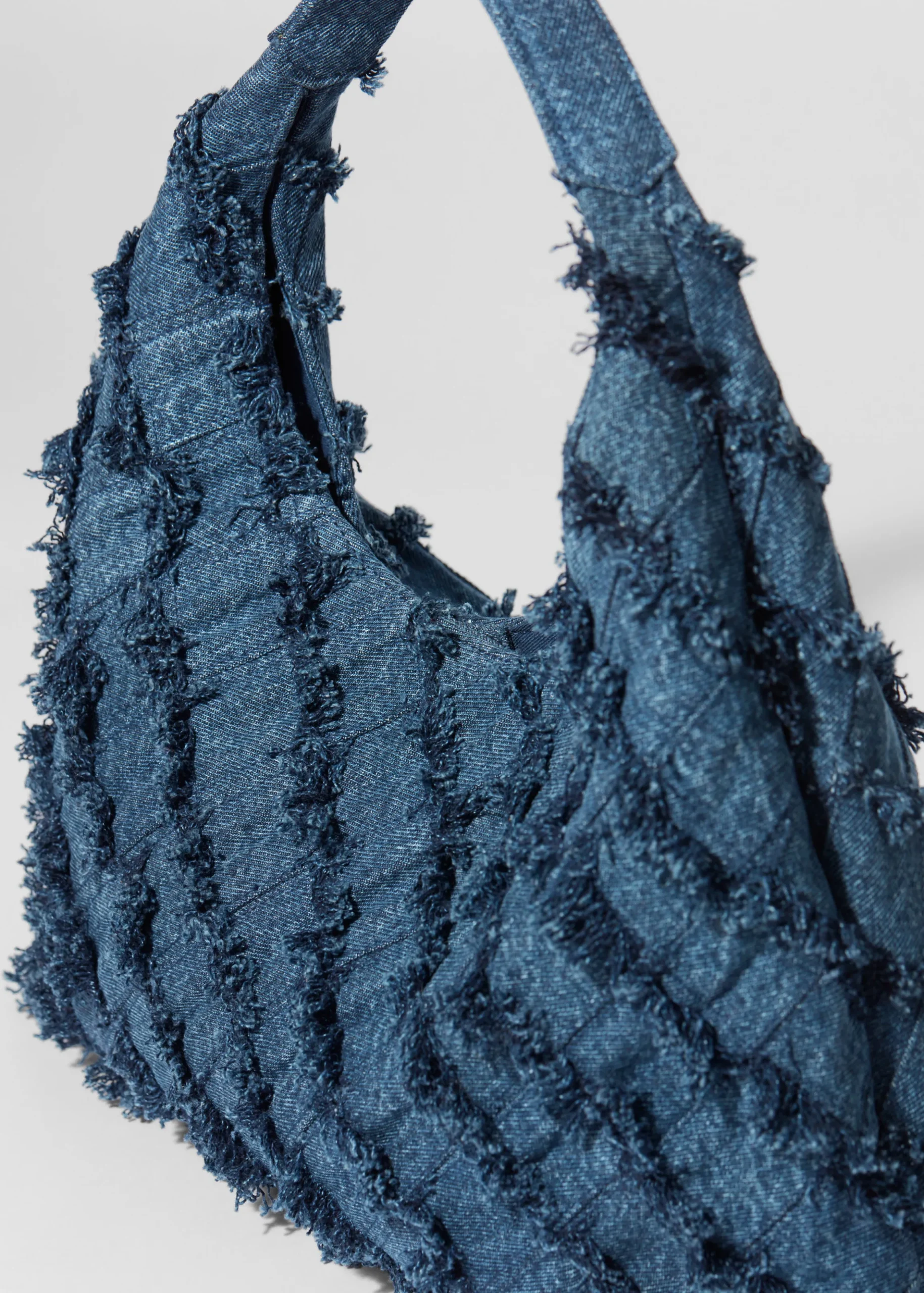 Tragetasche aus Denim in Flechtoptik