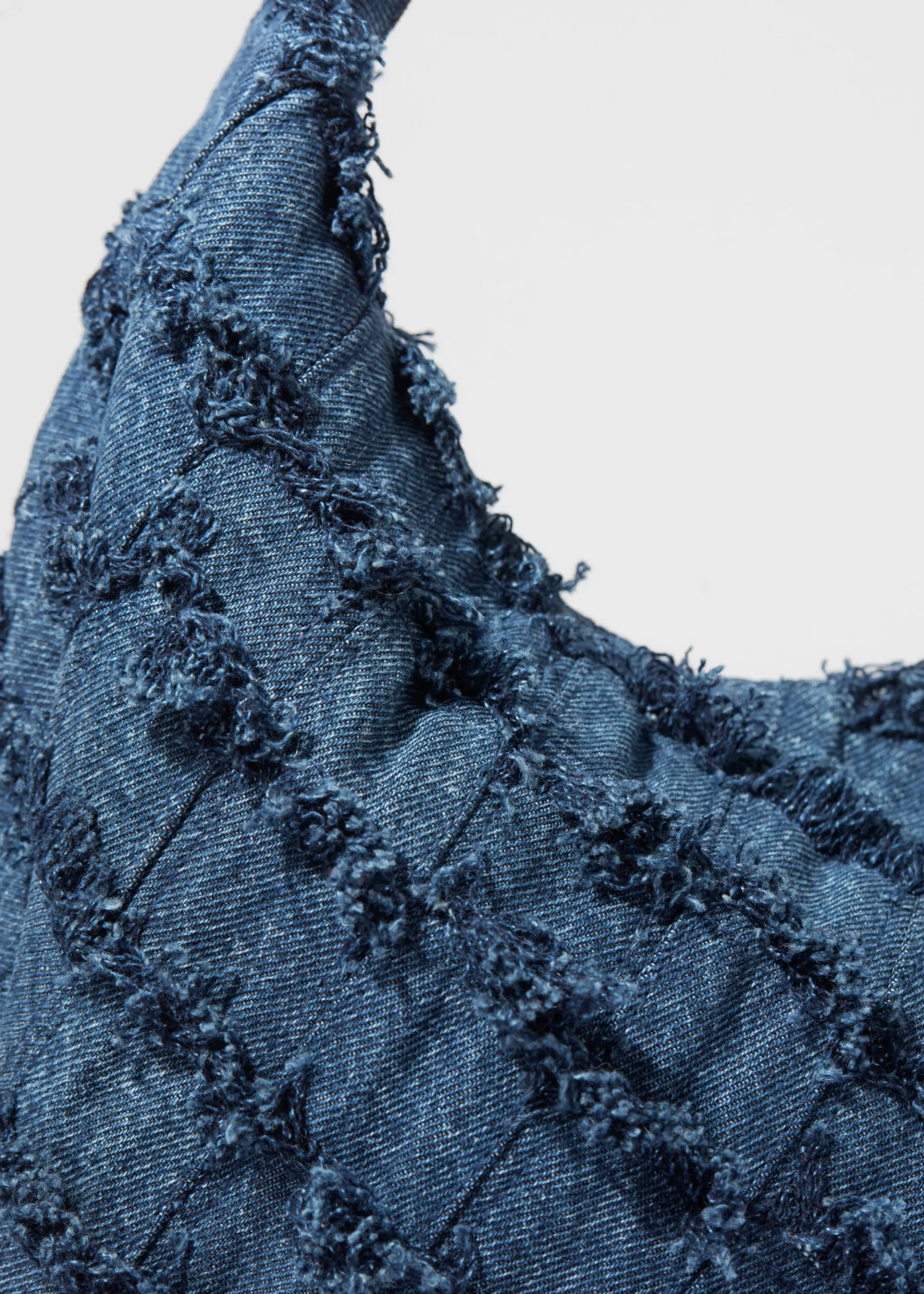 Tragetasche aus Denim in Flechtoptik