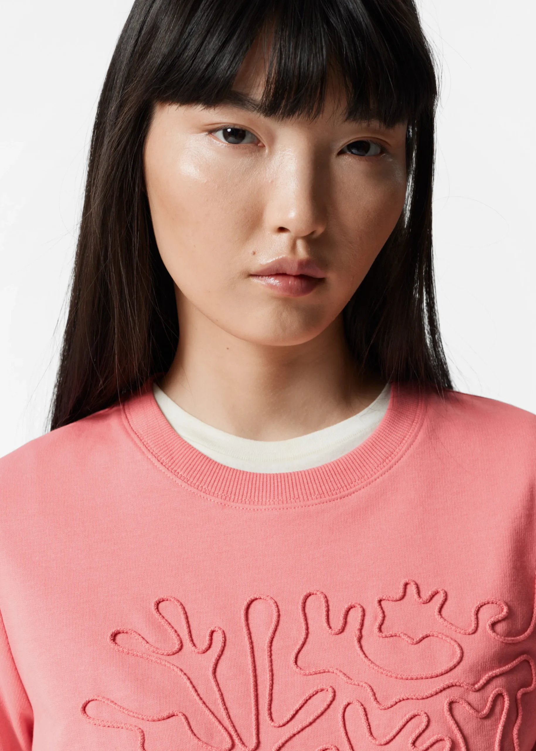 T-Shirt mit Blumenapplikation