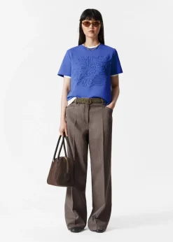 T-Shirt mit Blumenapplikation