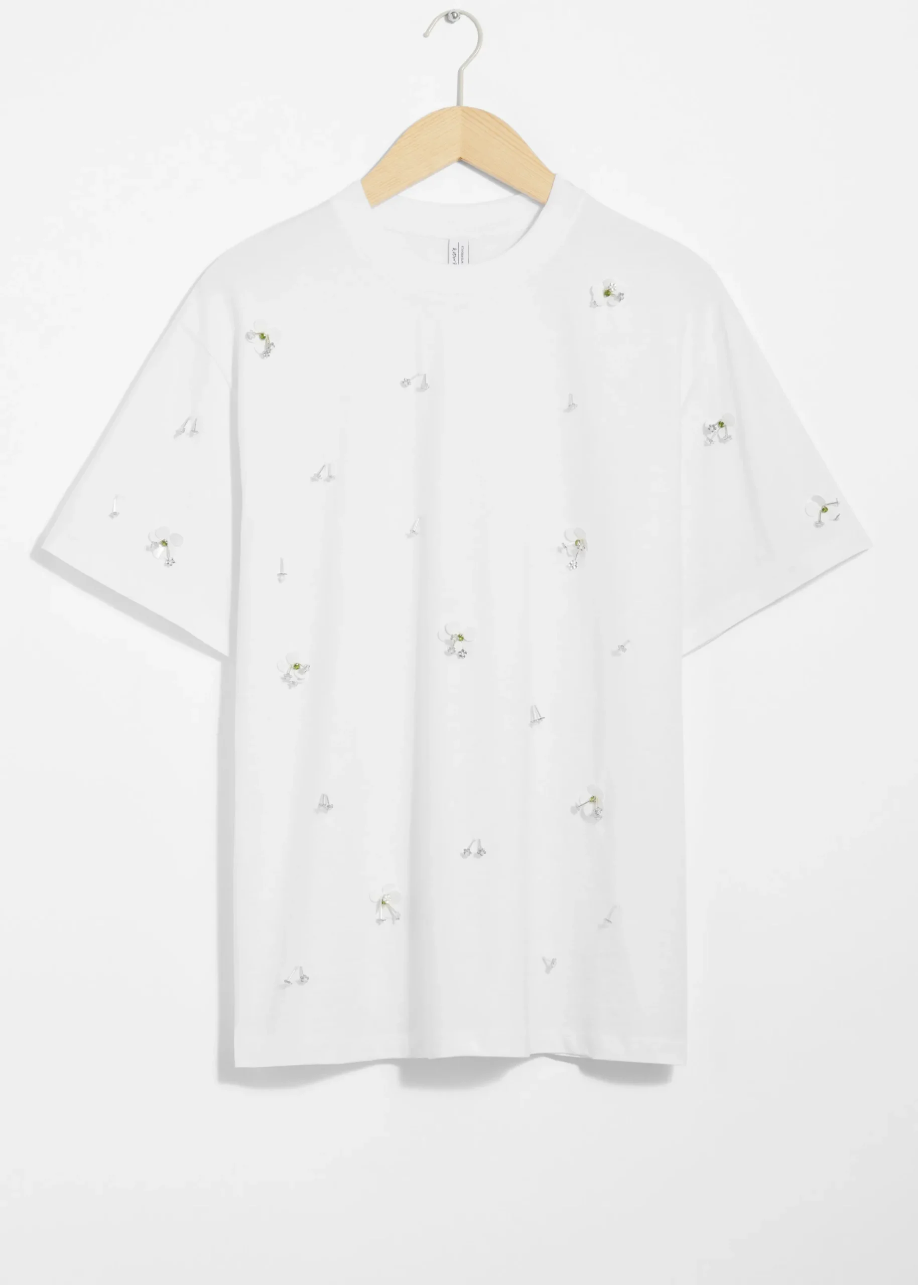 T-Shirt mit Blumenapplikation